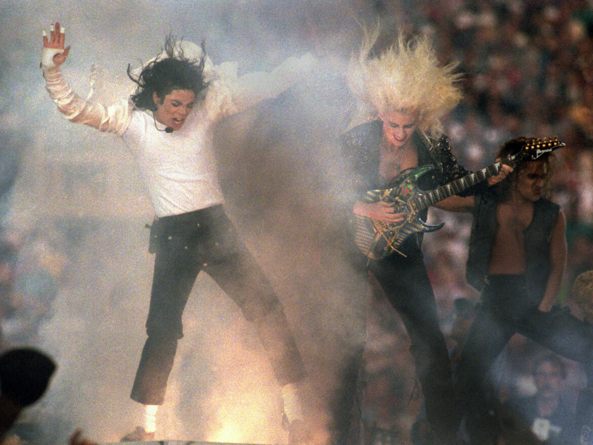Michael Jackson performs during the Super Bowl Halftime show in 1993, the year that "Think Twice" picks up his story. George Rose/Getty Images
