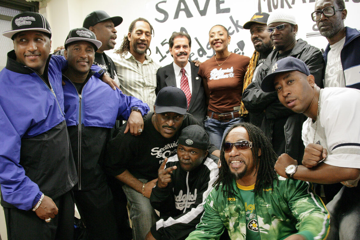 DJ Kool Herc, Coke La Rock, Cindy Campbell, former New York Rep. Jose Serrano and other musicians and artists gathered in the recreation room at 1520 Sedgwick Ave. for a ceremony in 2007. Enid Alvarez/NY Daily News Archive via Getty Images