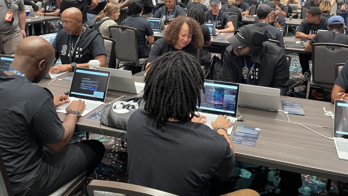 Marvin Jones (left) and Rose Washington-Jones (center), from Tulsa, Okla., took part in the AI red-teaming challenge at Def Con earlier this month with Black Tech Street.
Deepa Shivaram/NPR