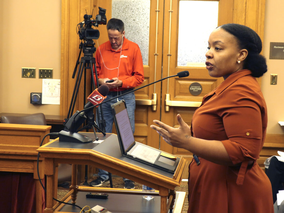 Michele Watley, founder of Shirley's Kitchen Cabinet, testifies in favor of a bill before the Kansas Legislature to ban discrimination based on hairstyles in employment, housing and public accommodations during a committee hearing, Tuesday, Jan. 28, 2020, at the Statehouse in Topeka, Kan.
John Hanna/AP