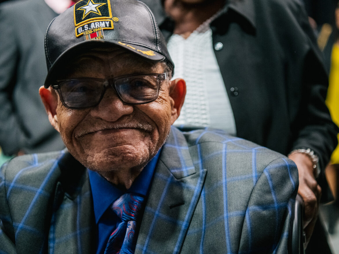 Hughes Van Ellis, one of the last known survivors of the Tulsa Race Massacre of 1921, has died at age 102. He's seen here smiling at a rally commemorating the 100th anniversary of the massacre in June 2021 in Tulsa, Okla. Brandon Bell/Getty Images