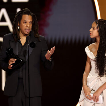 Jay-Z (left) accepts the honorary Dr. Dre Global Impact Award alongside his daughter, Blue Ivy Carter, during the 66th Grammy Awards on Sunday, Feb. 4, 2024, in Los Angeles. Kevin Winter/Getty Images for The Recording Academy