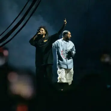 J. Cole and Drake perform during the 2023 edition of Cole's Dreamville festival in Raleigh, N.C., last April. Their collaborative track "First Person Shooter" recently touched off a war of words with fellow MC Kendrick Lamar. Astrida Valigorsky/WireImage/Getty Images