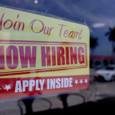 A sign seeking job applicants is seen in the window of a restaurant in Miami, Florida, on May 5, 2023. Joe Raedle/Getty Images