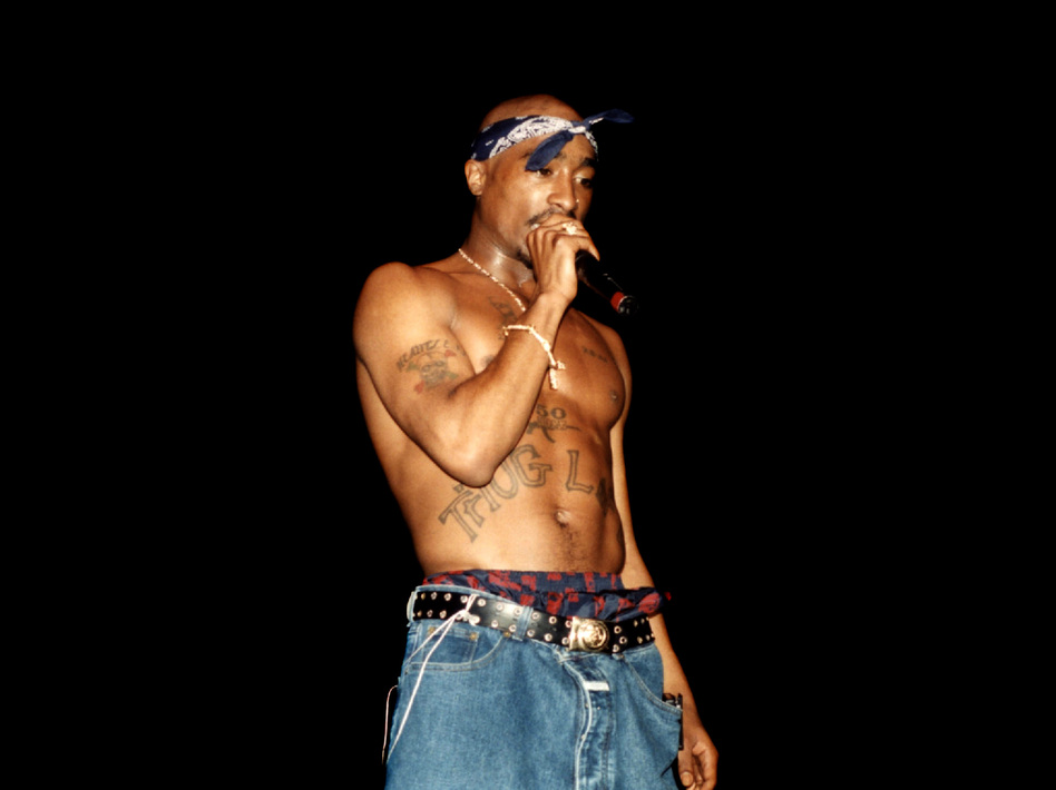 Rapper Tupac Shakur performs at the Regal Theater in Chicago, Illinois in March 1994. Raymond Boyd/Getty Images