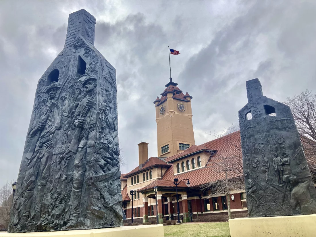 Sculptures representing charred chimneys rising from the smoldering rubble of burned-out buildings make up the centennial memorial of the 1908 race riot, entitled Acts of Intolerance by Preston Jackson, on March 22, 2023, in Springfield, Ill. John O'Connor/AP