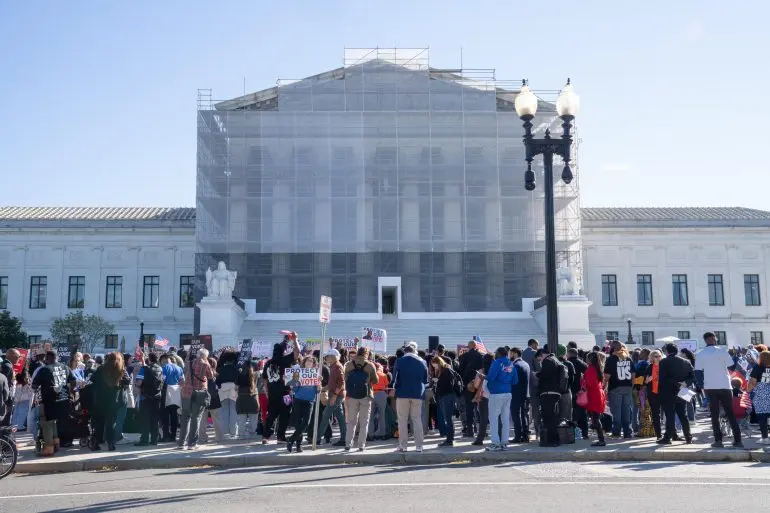 People gather in support of minority voting rights outside the U.S. Supreme Court in Washington, D.C., on Wednesday.